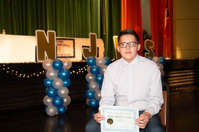 Martin Mendoza poses with his certificate